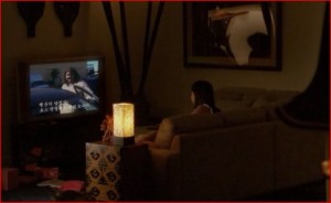 Jin is delivering a "message" and the guy points to his daughter. Look at what she's watching.